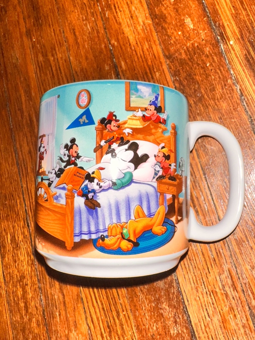 Walt Disney "Mickey Mouse Through the Years" Collectable Blue Ceramic Mug Cup